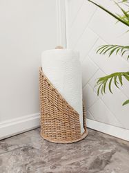 Paper towel holder standing. Wicker handmade holder for kitchen towels