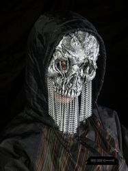 Metal mask. Chain mask. Monochrome mask. Half mask. Silver face. Silver mask. Halloween costume.