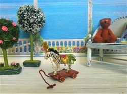 zebra on wheels.toy for a doll. dollhouse miniature.1:12 scale.