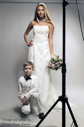 classic stile pensil wedding dress. Ivory synthetic lace fully embellished with pearls embrodery sequins and beads fairy