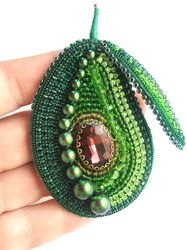 Green avocado crystal brooch