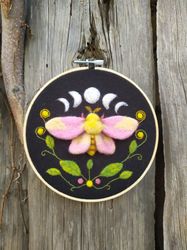 Rosy maple moth wall hanging
