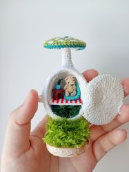mushroom house with crochet miniature bear