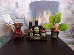 a set of bottles in a box.bottles with poisons. dollhouse accessories.1:12 scale.