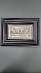 Silver plated ikon in a wooden frame is an expensive gift for an anniversary, Christian icon, flamed ikon