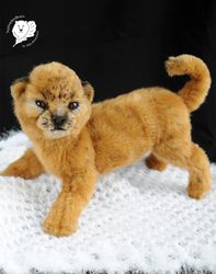realistic toy lion cub pet portrait wild cat