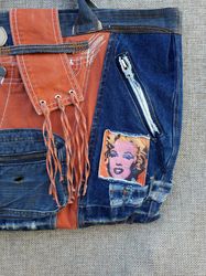 Women's denim bag made of new jeans, combined with an orange raincoat fabric, four pockets with locks are roomy