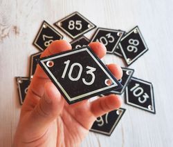 Small rhomb number sign 103 - vintage black metal address plate