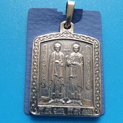 Sts Florus and Laurus the venerable martyrs icon pendant plated with silver free shipping from Orthodox store
