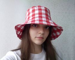 Checkered bucket hat. Cute summer hat for women. A fashion hat for traveling in checkers. Plaid red and white sun hat.