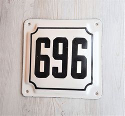 Street number sign 696 - vintage Soviet white black address house number plate