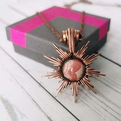 rhodochrosite necklace. sun necklace with rhodochrosite bead. wire wrapped copper pendant.