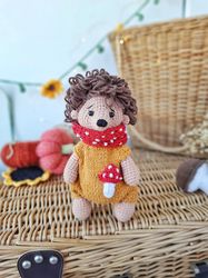 Stuffed hedgehog toy for gift. Little hedgehog soft toy in autumn suit for baby present. Plush hedgehog toy. Stuffed toy