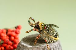 Handmade insect beetle brooch, made in pleasant forest shades.