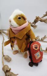 Edward Bisquit, needle felted guinea pig who loves to travel