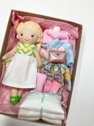 Blonde doll with the set of extra clothes & accessorizes (10 items)
