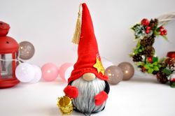 Christmas gnome with a gift, Scandinavian decor