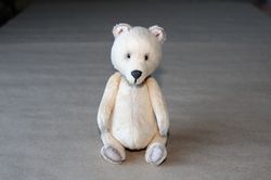 Teddy bear. Miniature teddy bear. Stuffed teddy. Mini handmade plush toy. Cute light yellow teddy