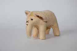 Teddy elephant. Cute light yellow miniature elephant. Mini handmade plush toy. Sweet plush toy