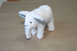 Miniature elephant. Teddy Elephant. Sweet plush toy. White elephant. Cute handmade toy elephant.