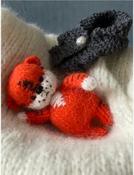 Knitted toy little orange tiger