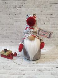 The Northern gnome. Scandinavian gnome. Winter holiday gnome. Christmas ornament. Tomte. A Christmas present.
