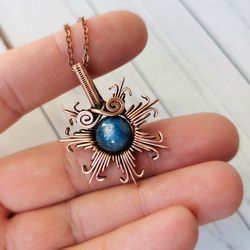 sun pendant with kyanite bead. wire wrapped copper necklace with kyanite.