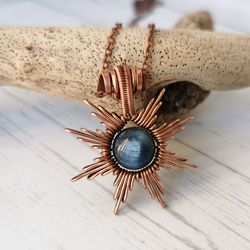 Star necklace with Kyanite bead. Wire wrapped copper pendant with blue Kyanite.