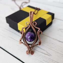 wire wrapped charoite necklace. wire weave copper pendant with charoite bead.