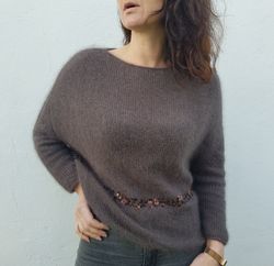 Angora sweater with sequins.
