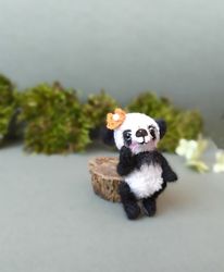 miniature knitted toy for collection and interior realistic panda
