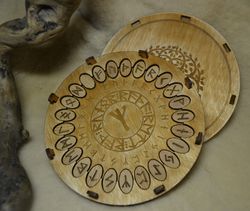 Rune set of Elder Futhark in the Round Box Wheel of Futhark.  Viking Divination wooden runes set. Oval norse pagan runes
