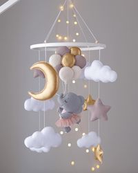 Ballerina-elephant with balls. Baby shower gift . Nursery crib decor