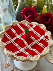 crocheted cherry pie measures approximately 7 inches wide