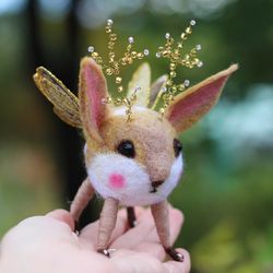Small deer made of wool is a collectible toy, craft felting. Fantastic doll for home decor, cute doll