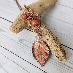wire wrapped copper necklace with real electroformed leaf and sunstone beads. copper leaf pendant with sunstone.