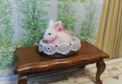 rabbit in the basket. puppet miniature.
