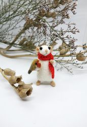 Miniature needle felted mouse with a robin in his paw