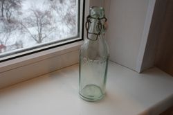 Vintage old glass bottle with ceramic top beer or mineral water