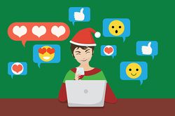 Man with laptop in Christmas hat, chatting online in social media