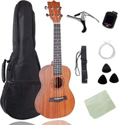 Ukulele kit with gig bag, picks, tuner, strap, strings, cleaning cloth, starter manual.