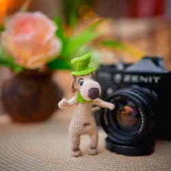 Crochet a miniature dog. Little puppy toy. Crochet brooch for a teenage girl.