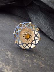Round brooch-pendant with chalcedony, titanium jewelry