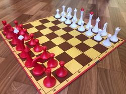 Soviet Ukraine Dnepropetrovsk chess set vintage: red white rockets plastic chessmen & carton chessboard