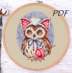 Cross stitch Owl with a lollipop cross stitch patterns design for embroidery pdf
