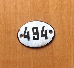 White black apartment door number sign 494 - Soviet enamel metal small vintage address plate