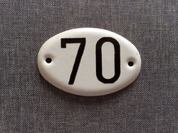 Black white apartment 70 address door number sign