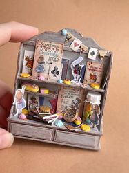 Miniature set in the style of Alice in Wonderland on the shelf for playing dolls, dollhouse, scale 1:12, miniature pastr