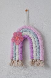 Decor decoration in the nursery on the wall rainbow handmade interior macrame pendant for the children's room for girl