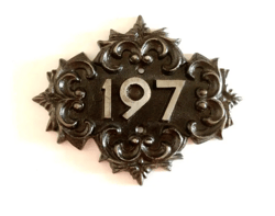 Old fashioned cast iron address sign 197 door number plaque vintage